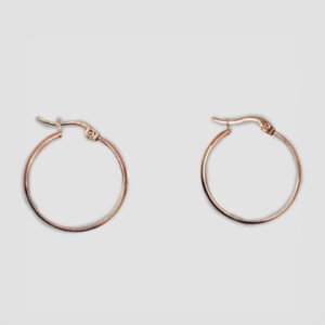 A pair of classic gold-color hoop earrings with a smooth, polished finish.