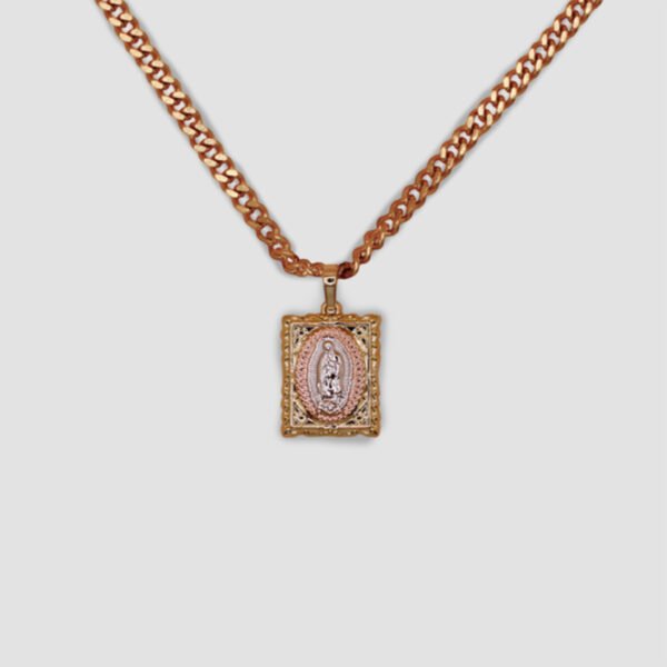 A Virgin Mary gold color pendant necklace with a textured chain.